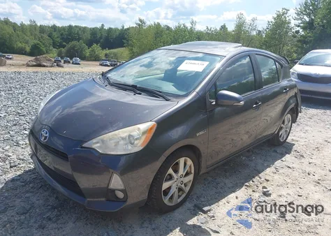 2012 Toyota Prius C Four z USA, uszkodzony, nr VIN JTDKDTB31C1002182